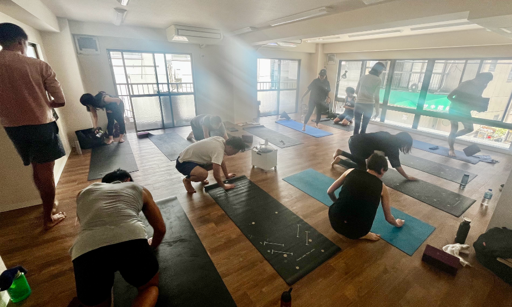 yoga students in the yoga studio in Shibuya, Tokyo